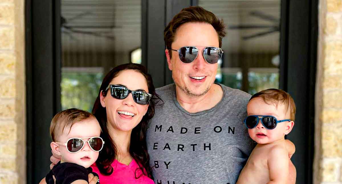 Elon Musk and Shivon Zilis with two children wearing sunglasses