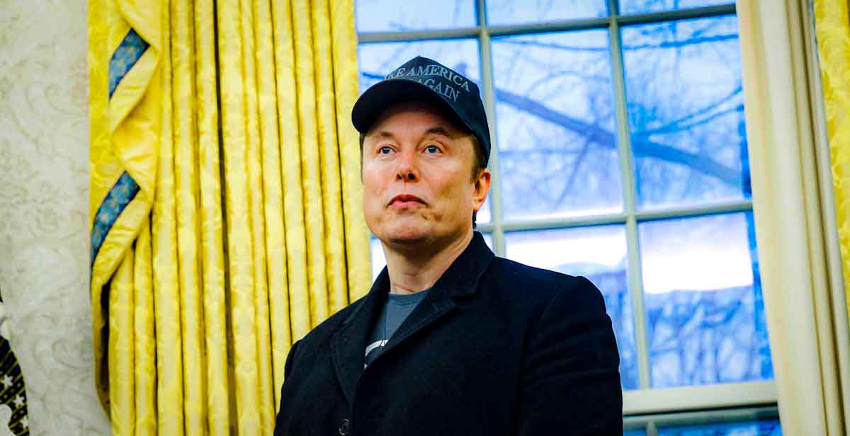 Elon Musk, chief executive officer of Tesla Inc., in the Oval Office of the White House in Washington, DC, US, on Tuesday, Feb. 11, 2025. Trump signed an executive action on Tuesday that orders agency heads to coordinate with Musk's Department of Government Efficiency to "significantly reduce the size of the government" and "limit hiring to essential positions." Photographer: Tas code